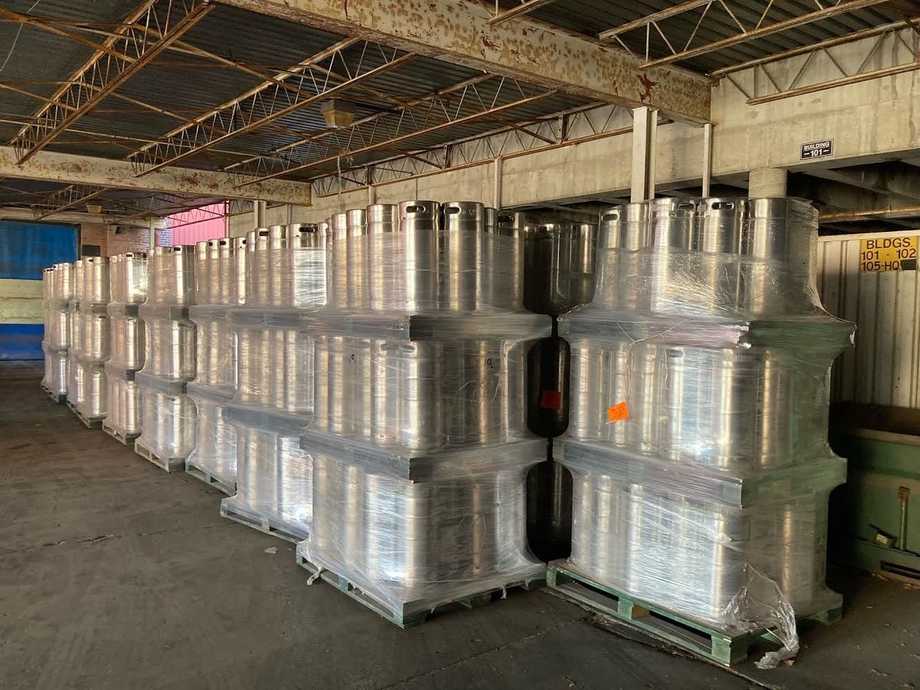 Palletized stainless steel kegs ready to ship in warehouse